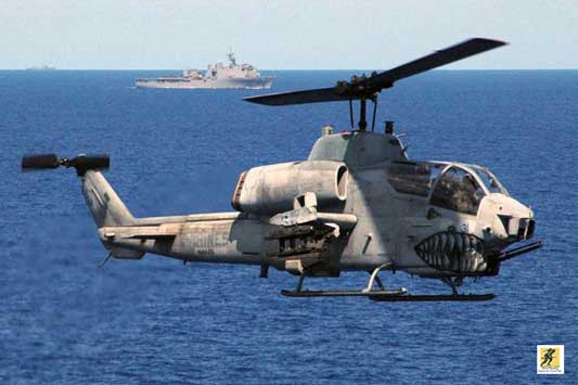Helikopter serang AH-1W Super Cobra dikembangkan oleh Bell untuk Korps Marinir AS (USMC). Helikopter ini berevolusi dari AH-1T dan mengikuti garis besar AH-1 Cobra.
