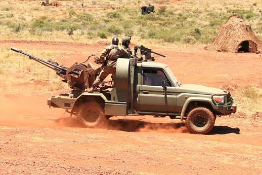 Land Cruiser taktis milik Afrika Selatan dipersenjatai dengan meriam kembar ZU-23-2 23mm Soviet