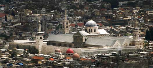 Umayyad Mosque atau Great Mosque of Damascus; Menurut sebuah hadis yang diriwayatkan oleh Muslim ibn al-Hajjaj, Masjid Agung Damaskus adalah tempat di mana Nabi Isa/Yesus akan turun, muncul di sebuah "menara putih".